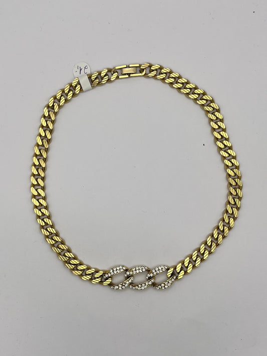 Goldfarbene Gliederkette mit Glitzersteinchen